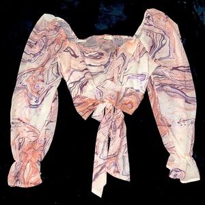 I am selling a beautiful cropped long sleeve blouse